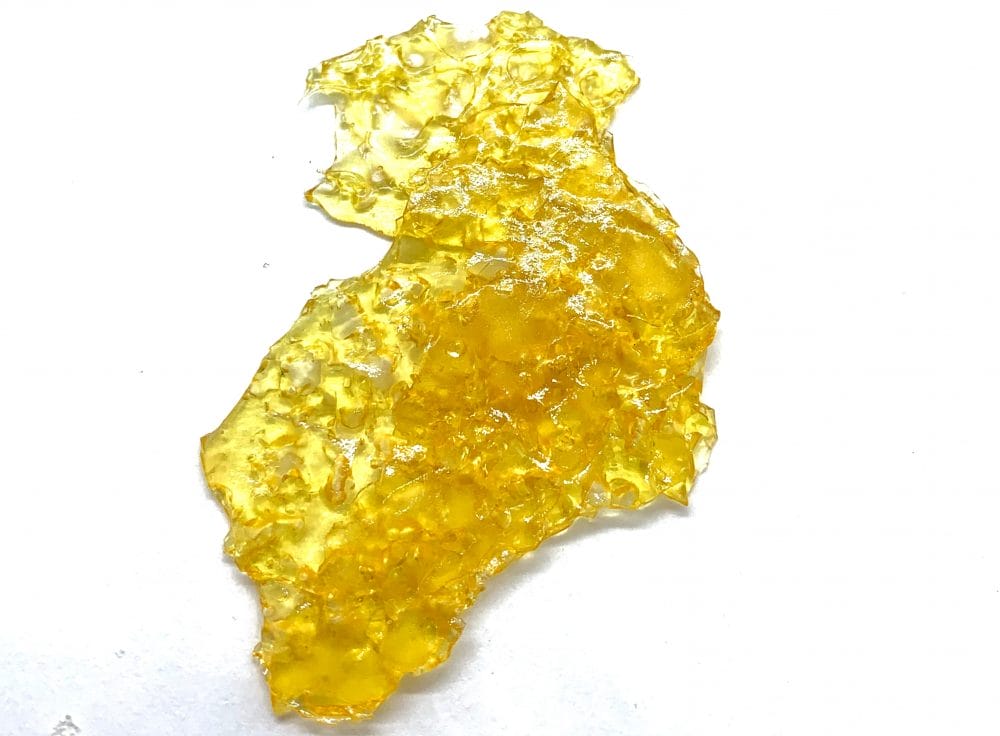 Sour Diesel Shatter-cannabisden | WeedSmart Canada